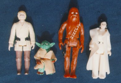 A picture of some Hungarian bootleg Star Wars toys, including Yoda