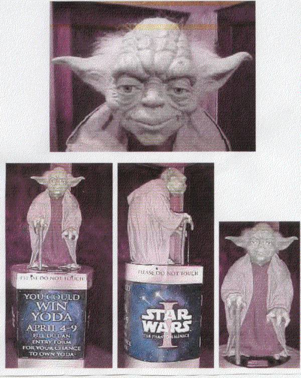 Blockbuster Yoda replica on cardboard stand
