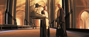 Yoda in his hover chair, talking to Obi-Wan and Mace (Attack of the Clones screenshot)