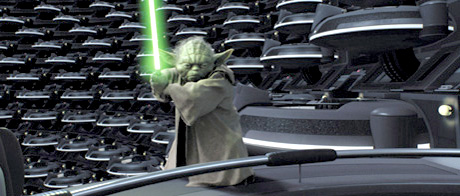 Yoda with his lightsaber extended in the Senate chamber