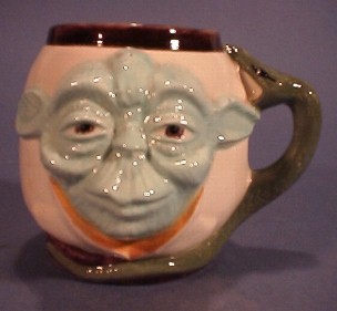 A ceramic Yoda mug