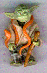 Complete old orange snake Yoda toy out of the package