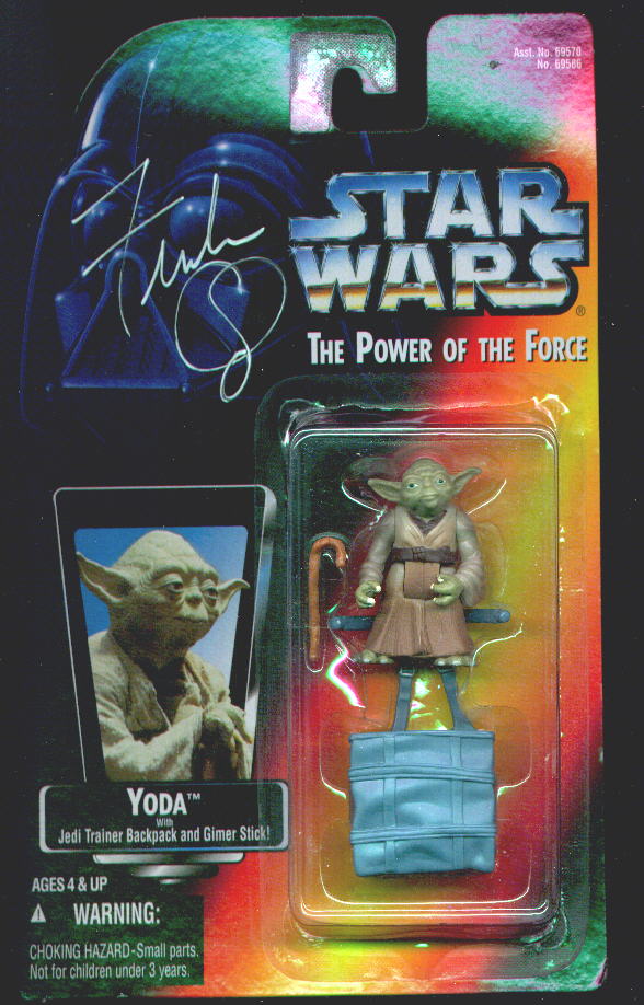 Red carded Yoda toy signed by Frank Oz