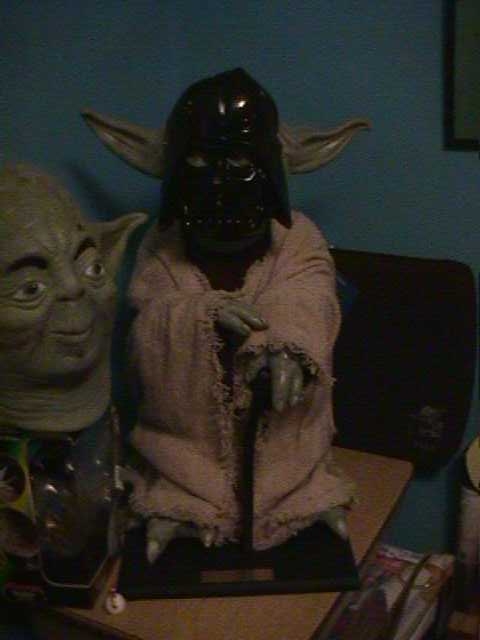 Yoda wearing a Darth Vader mask