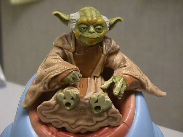 Episode I Yoda toy in Jedi Council chair