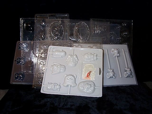 A Yoda lolipop mold, with others