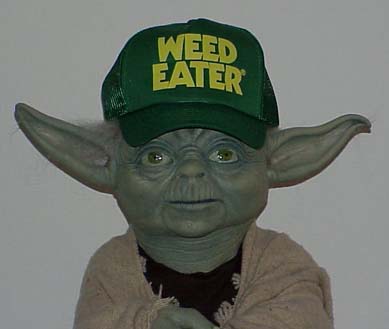 Illusive Concepts Yoda replica wearing a Weed Eater hat