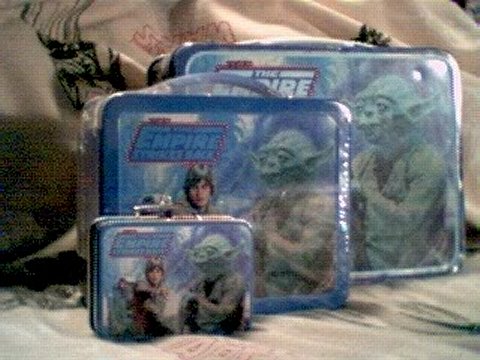 Regular Empire Strikes Back lunchbox, Hallmark replica lunchbox, and Keepsake Ornament lunchbox