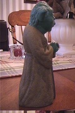 Right side view of a vintage Mexican Yoda bank