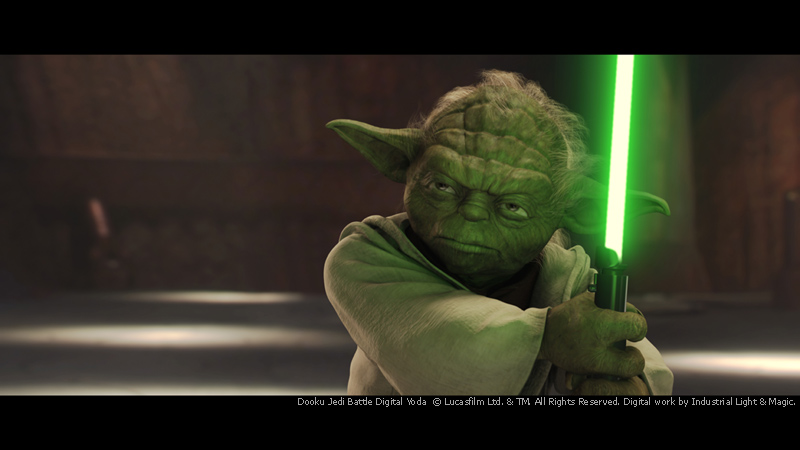 Yoda with his lightsaber drawn (from Attack of the Clones)