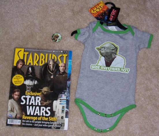 Starburst Magazine, Yoda pin, and Yoda onesie
