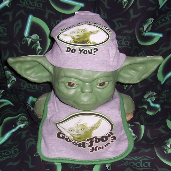 Yoda bust wearing bib and beanie
