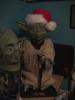 Yoda wearing a Santa Claus hat - 480x640