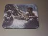 A mousepad with Luke and Yoda on it - 512x384