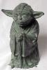 A bronze Yoda statue - 395x576