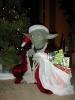 Lifesize Santa Yoda replica with a bag full of gifts - 960x1280