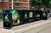 A bus shelter with Revenge of the Sith Yoda advertisements - 450x299
